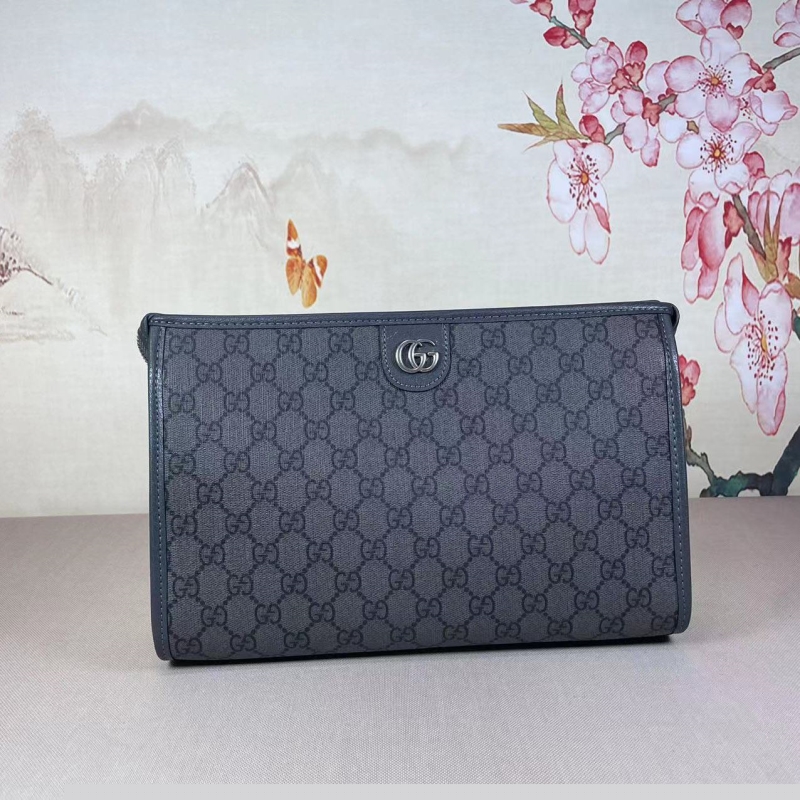 G*u*i clutch bags